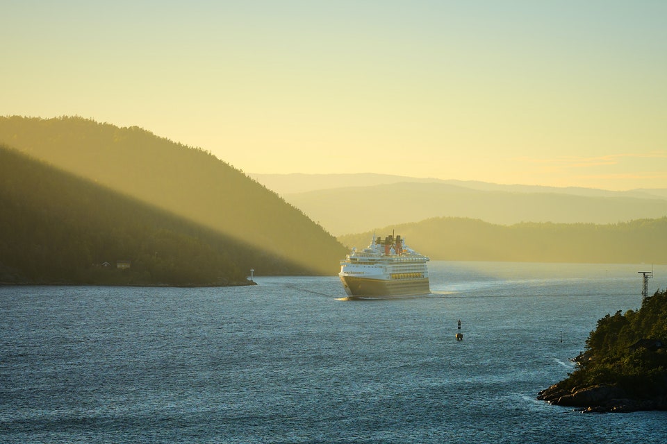 Image may contain: Boat, Transportation, Vehicle, Yacht, Land, Nature, Outdoors, Sea, Water, Landscape, Cruise Ship, and Ship